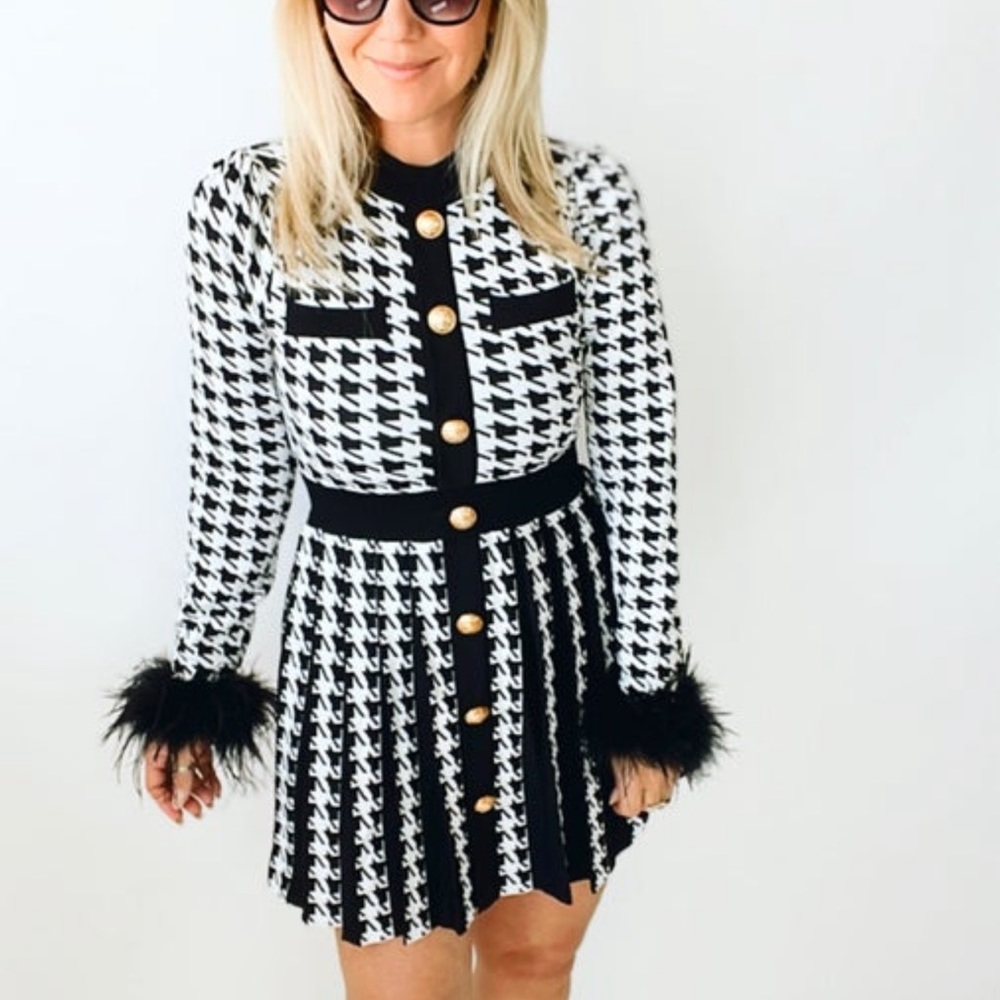 NWT adorable houndstooth dress with pleats and feather trim sleeve!